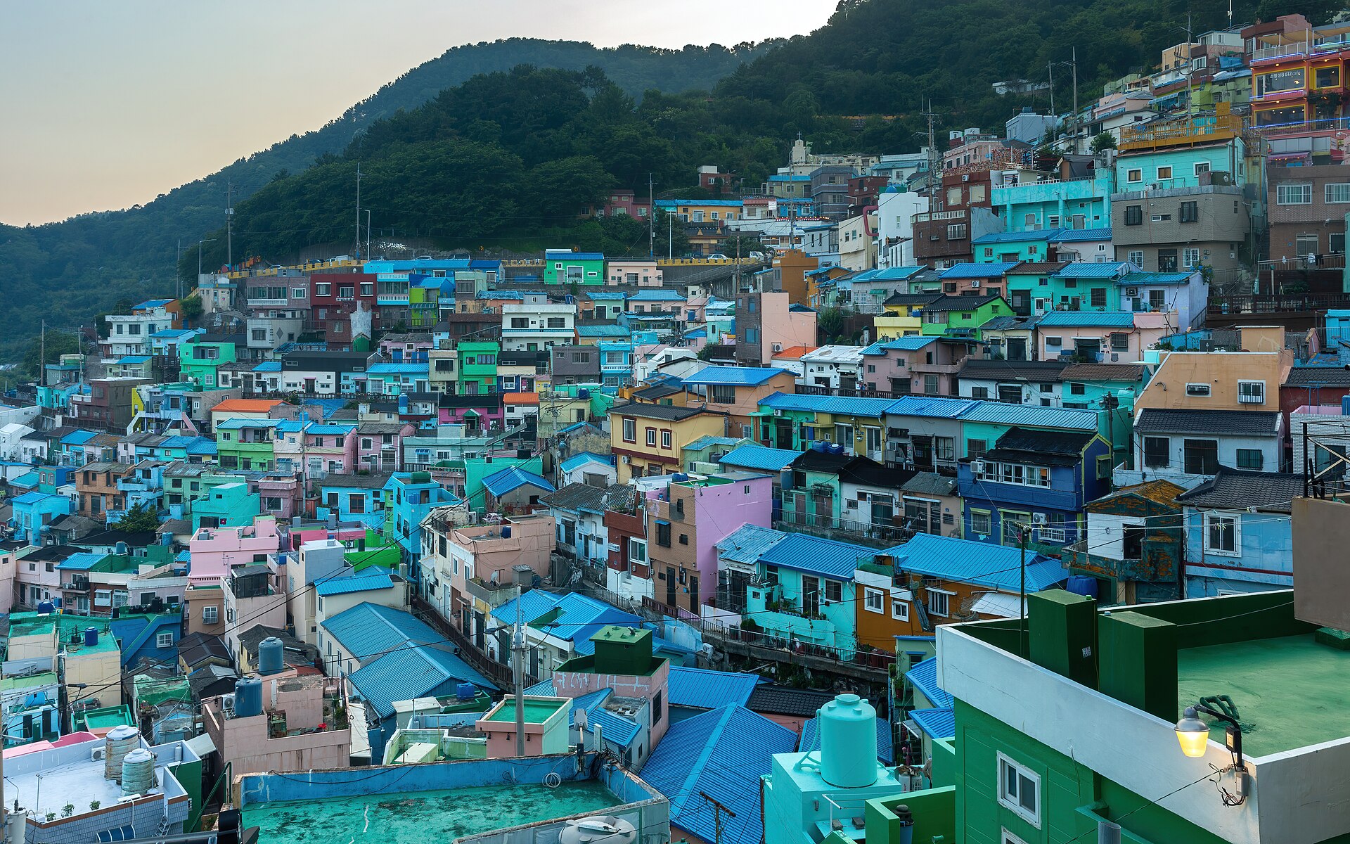 The colorful pastel hillside houses of Gamcheon Culture Village in Busan at dusk
